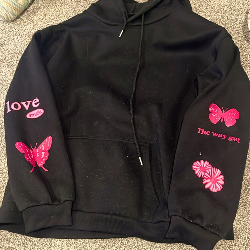 A black graphic design SHEIN hoodie, worn a few times